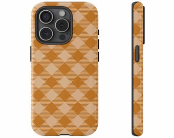 May include: A phone case with a repeating orange and tan gingham pattern. The case has a camera cutout and black side buttons. The side view shows the case's thickness and a black button.
