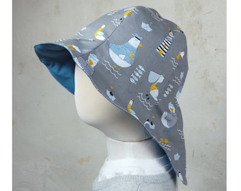 Reversible: sombrero para el sol para niños con ala que se funde en una protección para el cuello con banda elástica, algodón Ökotex, fabricado en Weserbergland