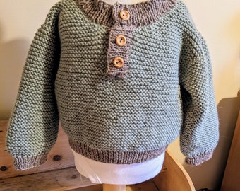 Hand knitted baby jumper