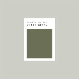 May include: Sculpey Souffle Khaki Green polymer clay colour sample card. The card shows a square sample of the clay colour.
