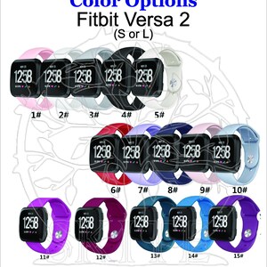 May include: A selection of 15 different colored silicone bands for a Fitbit Versa 2 smartwatch. The bands are shown in various colors, including pink, gray, black, white, red, purple, blue, light blue, and teal. The bands are numbered 1 through 15.