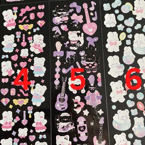 May include: Three sheets of stickers featuring cute cartoon characters. The stickers are on a black background and feature a variety of designs, including bunnies, hearts, stars, and musical instruments. The stickers are perfect for adding a touch of whimsy to your planner, journal, or laptop.
