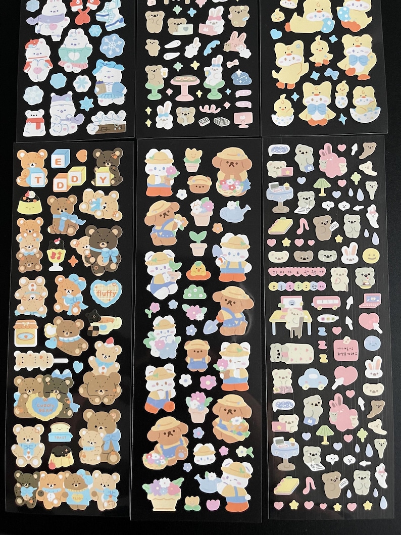 May include: A sheet of colorful stickers featuring cute cartoon bears, flowers, and other designs. The stickers are perfect for adding a touch of whimsy to journals, planners, and other craft projects.