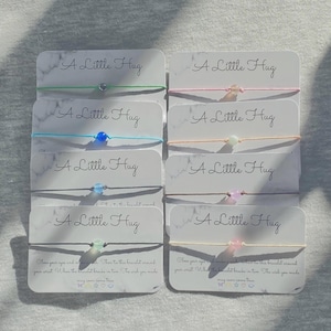 Pulsera de piedras preciosas con cordón y lazo pequeño para abrazos (Reino Unido)