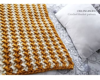 May include: A yellow and white striped crochet blanket with the text "ORLINGBURY Crochet blanket pattern" on a white pillow.