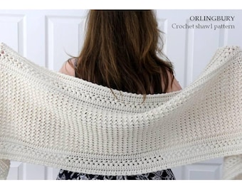 May include: An off-white crochet shawl featuring a textured stitch pattern with a decorative border. The text ORLINGBURY Crochet shawl pattern is visible in the upper right corner of the image.