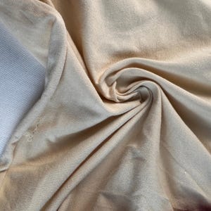 Kremowa bawełniana dzianina Spandex 10 oz Średnia waga Ekologiczna zrównoważona tkanina cięta na wymiar