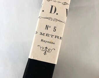 Vintage black velvet ribbon with original packaging
