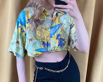 Camisa vintage de color amarillo oversize con manga corta