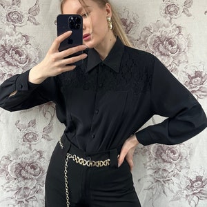 Vintage black blouse with lace details, elegant women’s long sleeve shirt