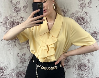 Vintage viscose yellow blouse with ruffle jabot neckline, elegant women’s shirt with short sleeves