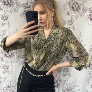 Blusa estampado vibora store