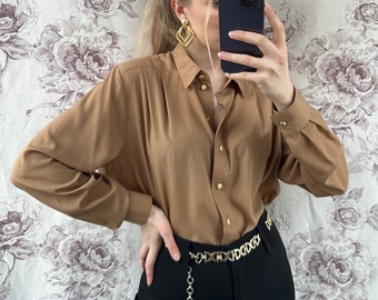 Vintage brown blouse with golden buttons, elegant women’s long sleeve shirt