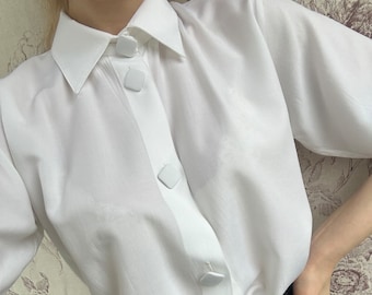 Vintage oversized white shirt with square buttons, elegant women’s shirt with short sleeves