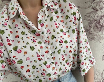 Vintage white blouse with pink and green flowers, feminine oversized shirt with floral print and short sleeves