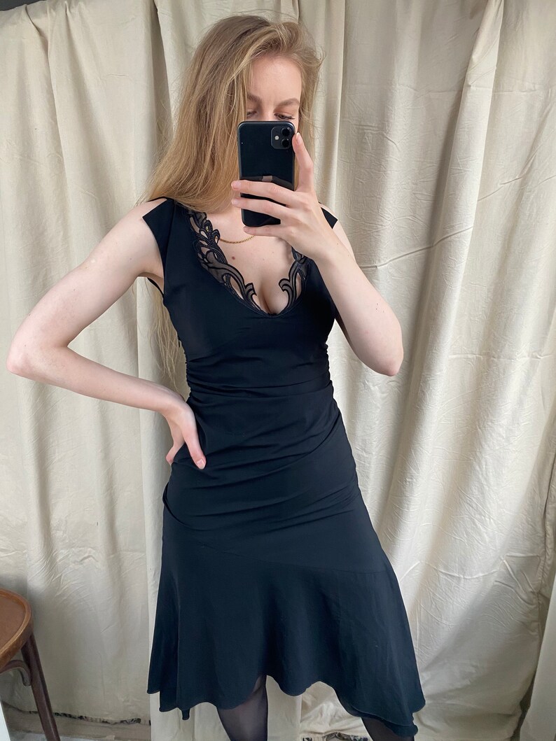 Vintage black midi dress with lace neckline