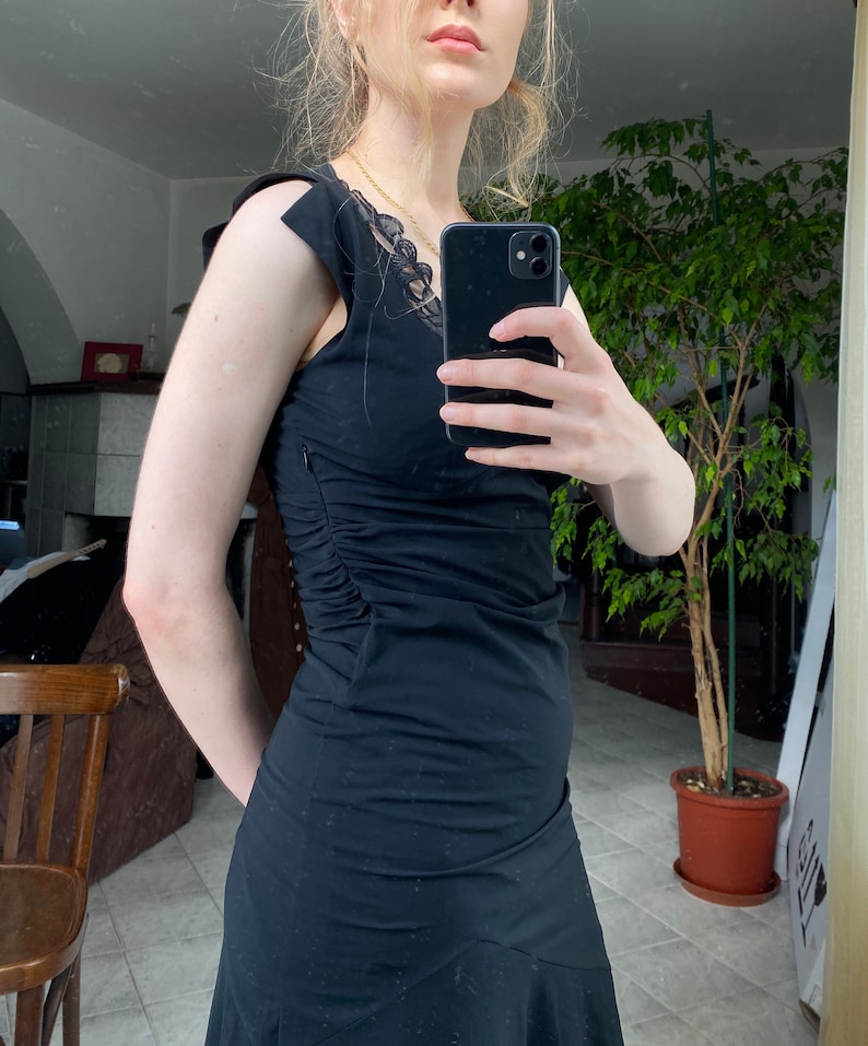 Vintage black midi dress with lace neckline
