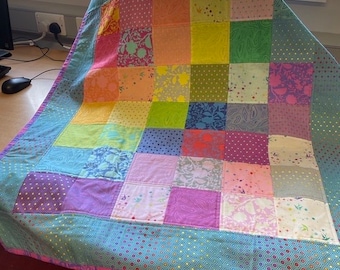 Bespoke handmade patchwork quilt for baby