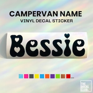May include: A black vinyl decal sticker featuring the name Bessie in a bold, rounded font with small heart cutouts inside the letters. The text CAMPERVAN NAME VINYL DECAL STICKER appears above, and a row of small coloured squares is below.