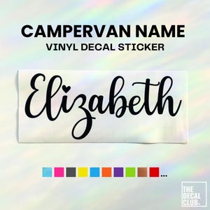 May include: A black vinyl decal sticker featuring the name Elizabeth in a cursive script font with a small heart above the letter i. The text CAMPERVAN NAME VINYL DECAL STICKER appears above, and a row of various coloured squares is below.