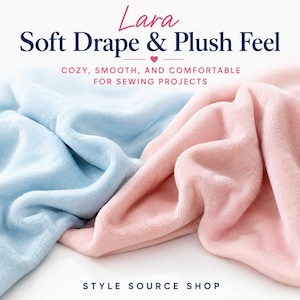 Light blue and light pink Lara smooth minky fabric draped to show its soft, plush feel and flexible drape. Text reads Lara Soft Drape & Plush Feel, Cozy, Smooth, and Comfortable for Sewing Projects, and Style Source Shop.