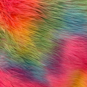 May include: Rainbow colored faux fur fabric with a gradient of colors from red to yellow to green to blue to purple.