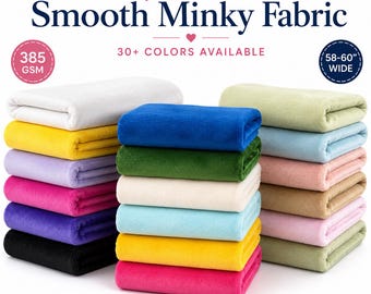 Könnte beinhalten: Lara glatter Minky-Stoff, 385 GSM, 147-152 cm breit. Zwei Stapel gefalteter Stoffe in verschiedenen Unifarben, darunter Weiß, Gelb, Lavendel, Pink, Lila, Schwarz, Blau, Grün, Creme, Hellblau, Beige und Salbeigrün. Text lautet Style Source Shop.