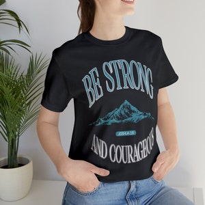 Strong and Courageous Bible Verse Teal Christian Graphic Tee Unisex Jersey Short Sleeve Joshua 1:9 Mountain