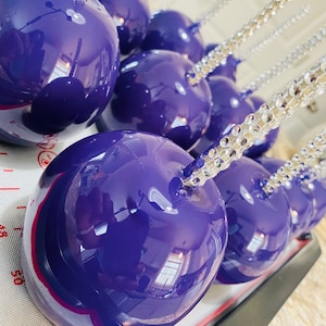 Purple candy it comes with 6 apples