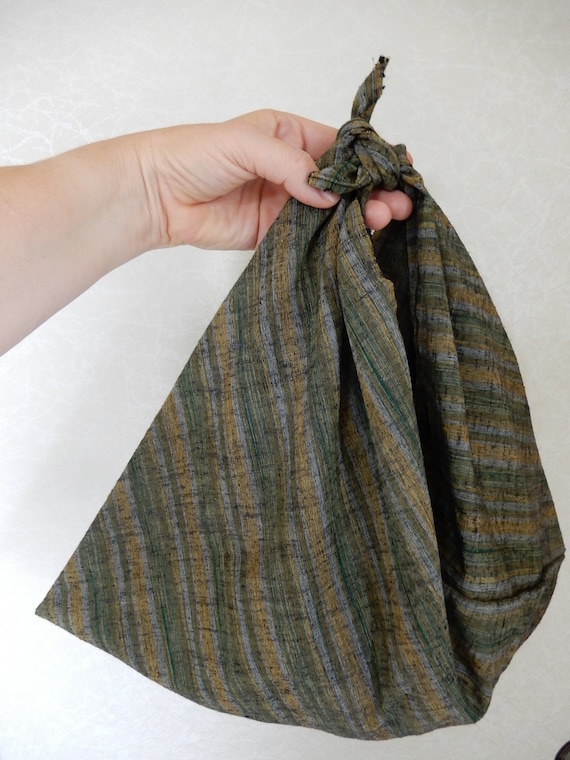 purse with plastic triangles