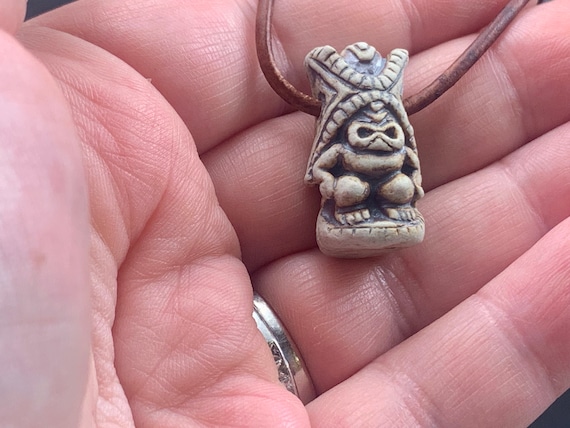 Tiki god necklace (ceramic high fired matte finish) on leather string