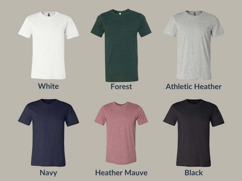 May include: Six different color t-shirts, including white, forest green, athletic heather, navy, heather mauve, and black.