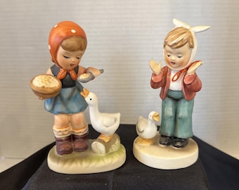 2 Vintage Erich Stauffer Hummel Style Boy With Toothache And Girl Feeding Geese
