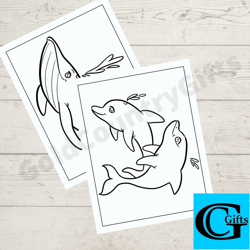 May include: A black and white colouring page featuring a whale and two dolphins. The whale is blowing water from its blowhole. The dolphins are swimming in a playful manner.