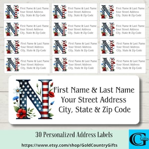May include: Address labels with a patriotic design. The labels feature the letter "N" in the colors of the American flag, with floral accents. The labels include space for the recipient's name, address, city, state, and zip code.
