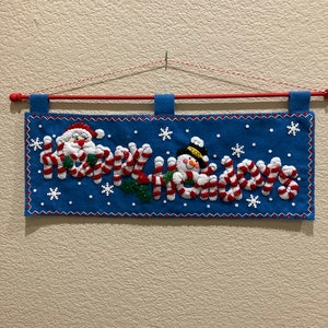 Banderole joyeux Noël avec le père Noël et Frosty le bonhomme de neige à accrocher au mur