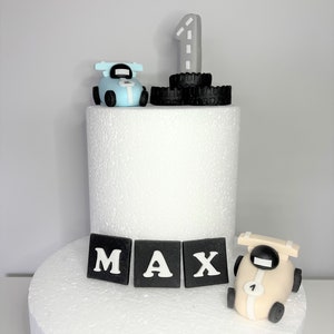 Racing car cake toppers set in neutral colours. Edible personalised birthday fondant cake decoration.  Handmade birthday boy decoration.
