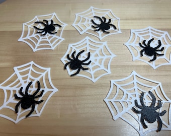 Handmade precut Halloween spiders and cobwebs. Wafer toppers for cupcake decorations. Black spider cupcake toppers