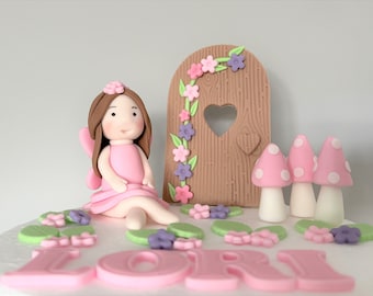 Personalised Fairy garden cake toppers for birthday cake. Girl decorations. Fondant Fairy door, toadstools and flowers. Flower theme cake.