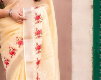 Pastel summer special Kota sarees in dove gray and lemon yellow shades. Floral embroidery work enhances the beauty of these elegant sarees.