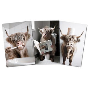 May include: A triptych of Highland cows in humorous bathroom scenarios. One cow brushes its teeth, another reads a newspaper, and the third wears a toilet paper roll on its head. The images are set against bathroom backgrounds.