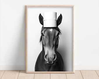 May include: Black and white photograph of a horse's head with a roll of toilet paper on its head, looking directly at the camera.