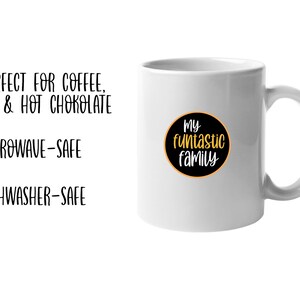 May include: White ceramic mug with a black and yellow circular design that reads "My funtastic family." The mug also has text that says it is microwave and dishwasher safe.