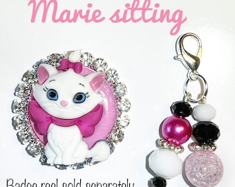 Marie badge reel