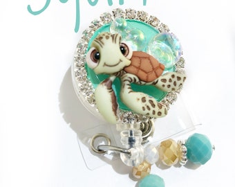 Squirt badge reel