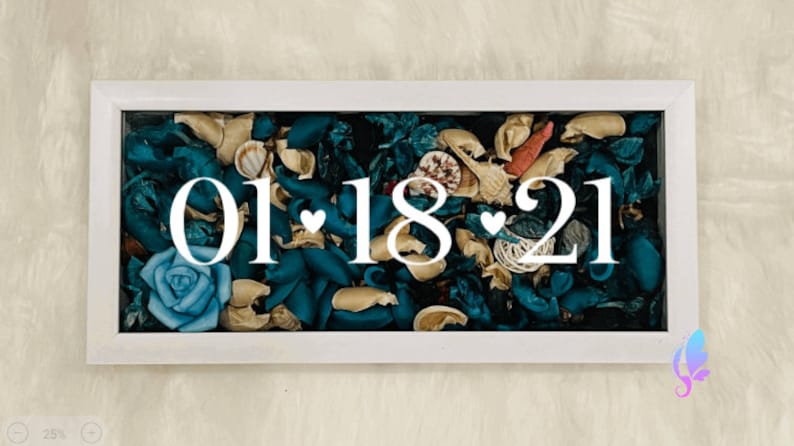 May include: White framed box with a blue and brown floral arrangement inside. The date "01 18 21" is displayed in white lettering.