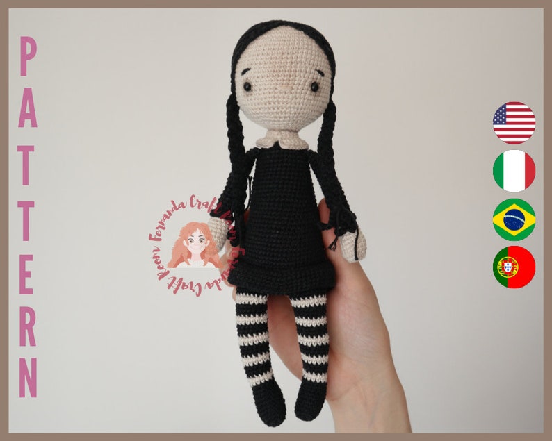May include: Crochet pattern for a black and white doll with pigtails. The doll is wearing a black dress and black and white striped stockings. The pattern is available in English, French, German, Dutch, Spanish, Italian, Polish, Portuguese, and Japanese.