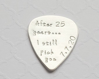 Custom sterling guitar pick