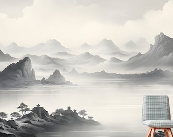 May include: A black and white illustration of a misty mountain landscape with a lake in the foreground. The scene features a small boat with two figures in the distance, and a single chair in the foreground.