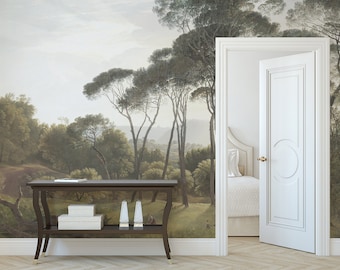 May include: A white door with a gold handle opens to reveal a bedroom with a white bed and white bedding. The door is framed by a white door frame and is set against a wall with a scenic wallpaper depicting a forest landscape with trees and a distant view of a town.